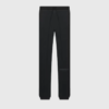 Pantalóne negro Essentials con logotipo