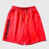 Short rojo Essentials con logotipo