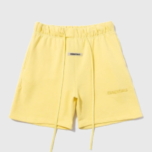 Short amarillo Essentials Logo